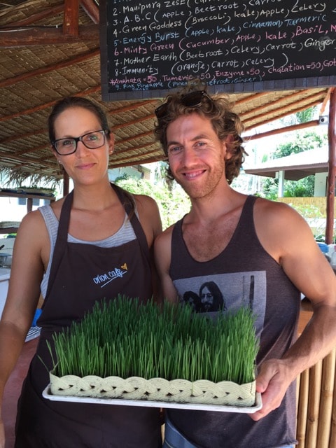 Derek and Dominique with a fresh tray of Wheatgrass