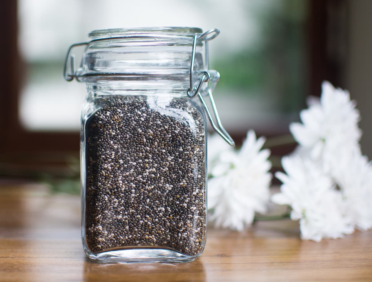 Chia Seeds in a glass jar with flowers